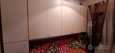  Armadio a ponte con letto