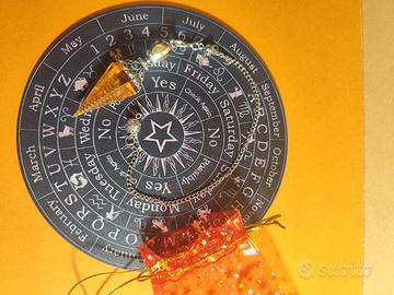 pendolo esoterico con tavola 