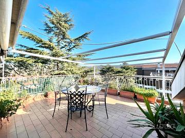 Attico con terrazzo e box