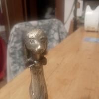 piccola scultura in peltro argentato 999