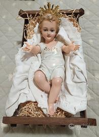 Statua di Gesù bambino + greppia