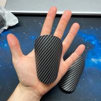 Mini parastinchi calcio fibra di carbonio