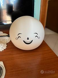 Lampada smile bianca sorridente che cambia colore