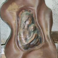 Madonna in metallo (bronzo?)con cornice in cuoio