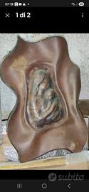 Madonna in metallo (bronzo?)con cornice in cuoio