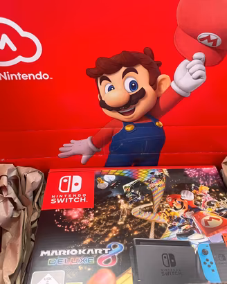 Nintendo Switch+Mario Kart 8 Deluxe Cartucia NUOVA