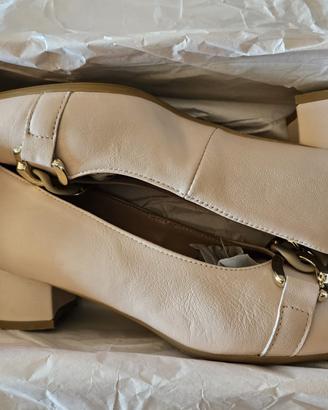 Scarpe in pelle pari al nuovo