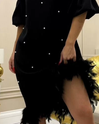 Abito da sera da donna con piume