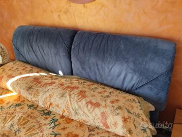 Letto e scrivania con sedia girevole