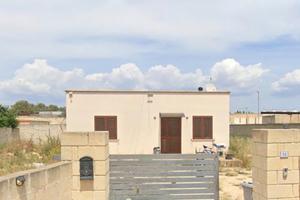 Terreno con fabbricato