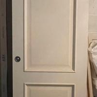 porta scorrevole in legno bianco