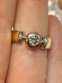 Anello in oro giallo, bianco e diamante