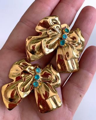 Orecchini vintage a clip a forma di fiocco dorati