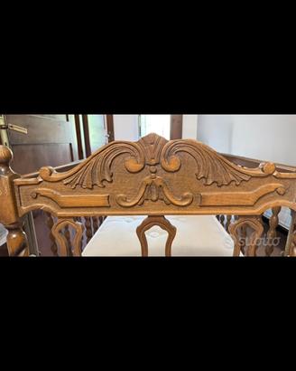 Culla basculante in noce.