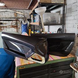 Componenti carbonio Ferrari e Lamborghini 