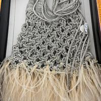 Borda in cordino di strass fatta a mnao