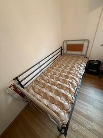 Letto con materasso antidecubito