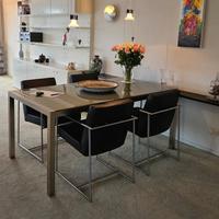 Tavolo in vetro con 4 sedie in pelle