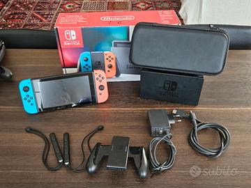 Nintendo Switch V1 neon completa con custodia