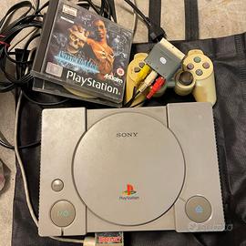 PlayStation 1 + volante, 2 giochi e Memory card