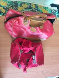 borse da viaggio vintage rosse e marroni 
