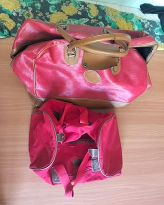 borse da viaggio vintage rosse e marroni 
