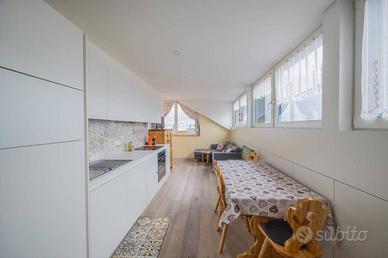 Appartamento all'ultimo piano con vista libera su