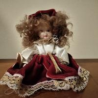 Bambola porcellana Capodimonte velluto rosso