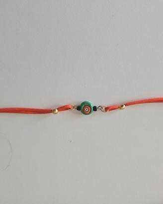 Bracciale cordino rosso con perla decorata