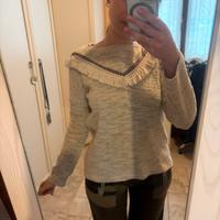 Maglia grigio melange con frange e ricamo