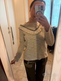 Maglia grigio melange con frange e ricamo