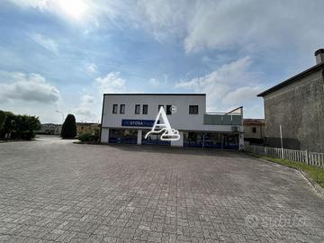 SHOWROOM - OFFICINA - MAGAZZINO E ABITAZIONE IN