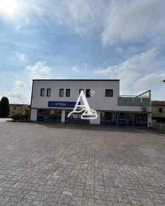 SHOWROOM - OFFICINA - MAGAZZINO E ABITAZIONE IN