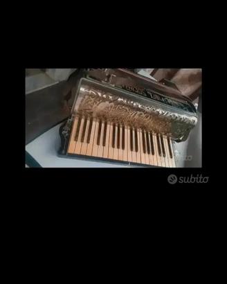 Fisarmonica antica.Vintage Fidelsocing