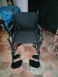 Sedia rotelle per disabile