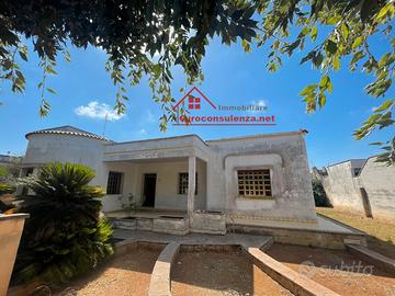Grande abitazione con giardino circostante