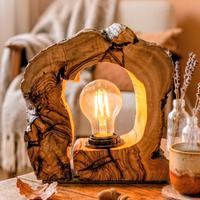 Lampada artigianale in legno di ulivo e luce calda