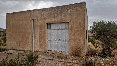 Terreno con fabbricato