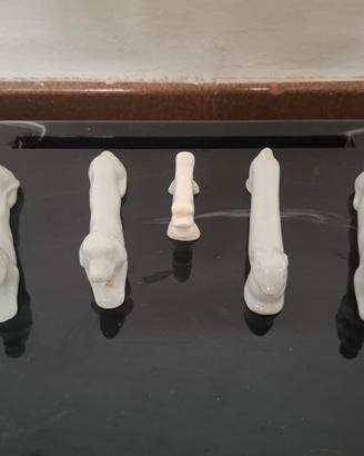 set di 5 poggia coltelli in porcellana Francese.