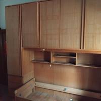 armadio a ponte e struttura letto, in legno rovere