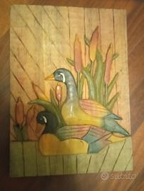 quadretti di legno intagliati e dipinti