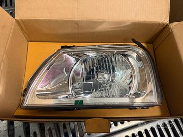 Faro Anteriore sx L200 MR439533