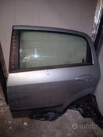 Portiera posteriore sinistra grande punto