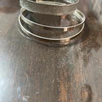 Set di 3 bracciali argentati Avon