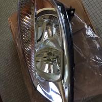 Faro originale Hella NUOVO per Renault Scènic