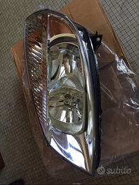 Faro originale Hella NUOVO per Renault Scènic