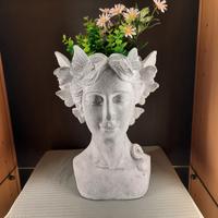 portavaso in resina testa di donna greca