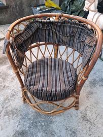 poltroncina tonda in rattan anni 60