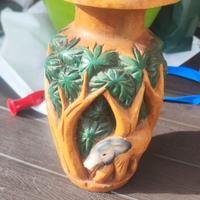Vaso decorativo in legno intagliato