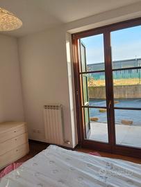 Zanica ampio bilocale con giardino privato